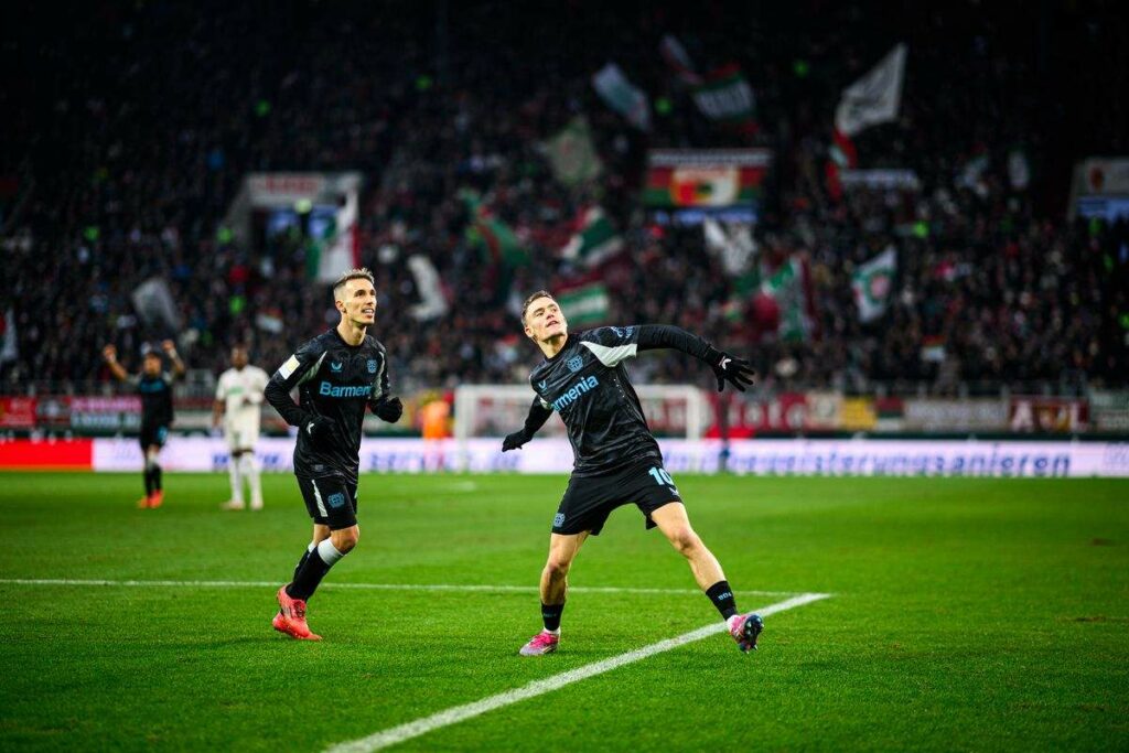 Florian Wirtz celebrates scoring yet another goal for Bayer Leverkusen