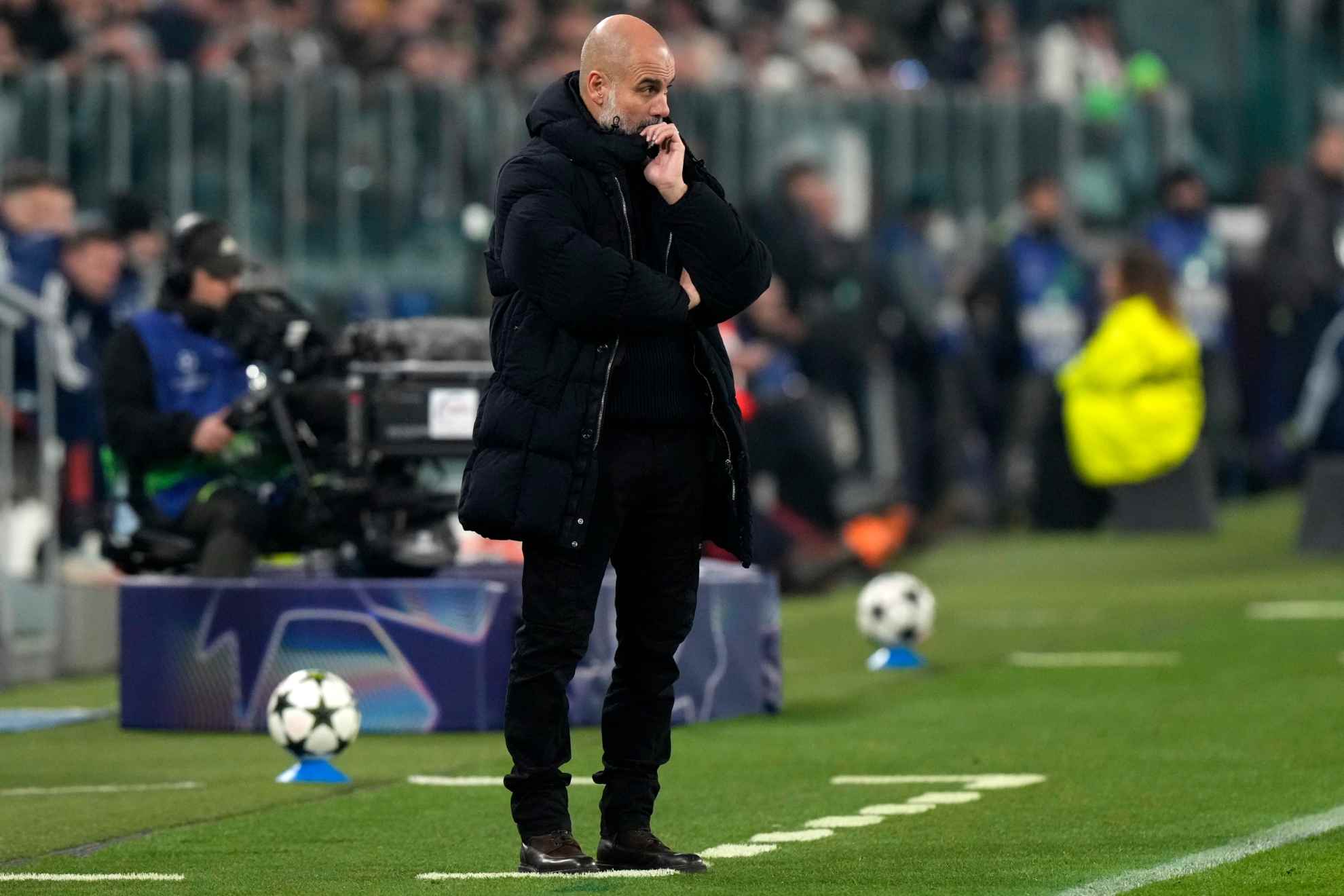 Pep Guardiola on the sidelines during a Champions League match against Juventus