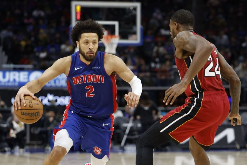 Cade Cunningham dribbles during the NBA game between Detroit Pistons and Miami Heat