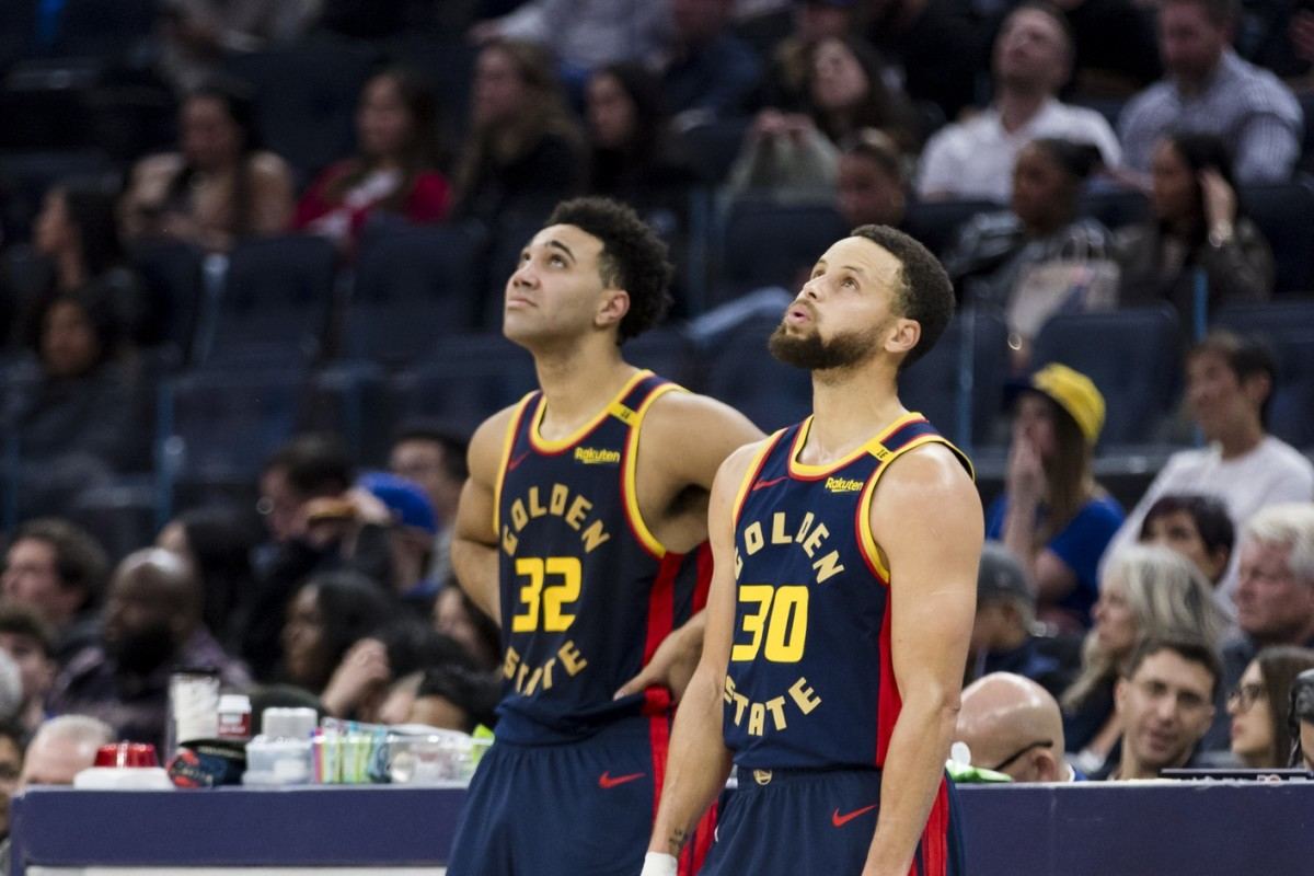 Steph Curry and Trayce Jackson Davis in the Warriors' loss to Miami Heat