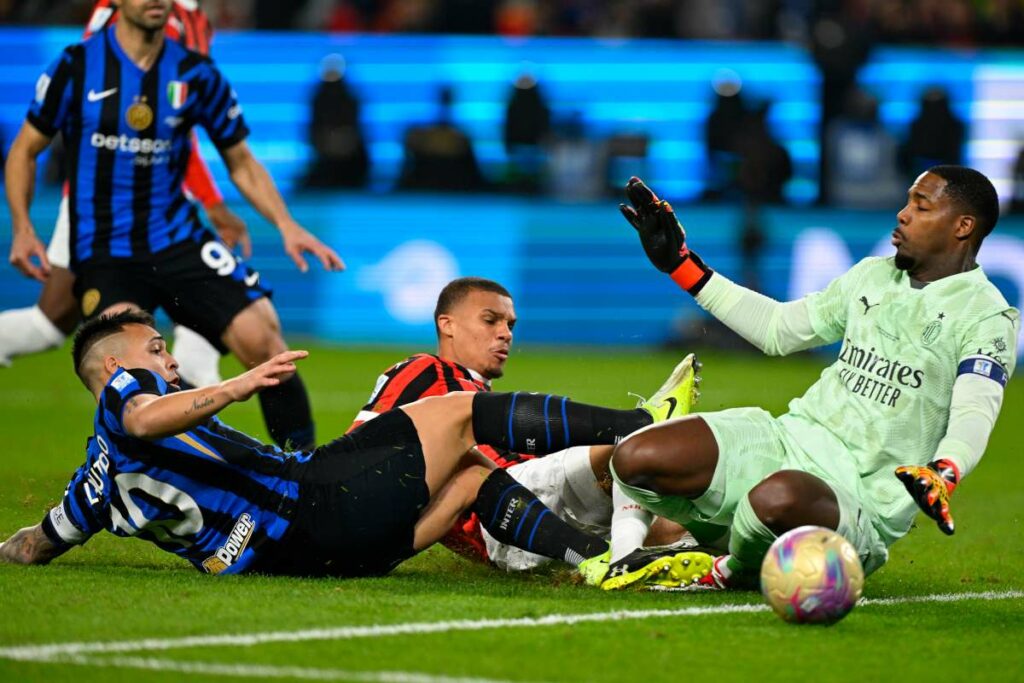 Mike Maignan denies Lautaro Martinez in the Italian Super Cup Final