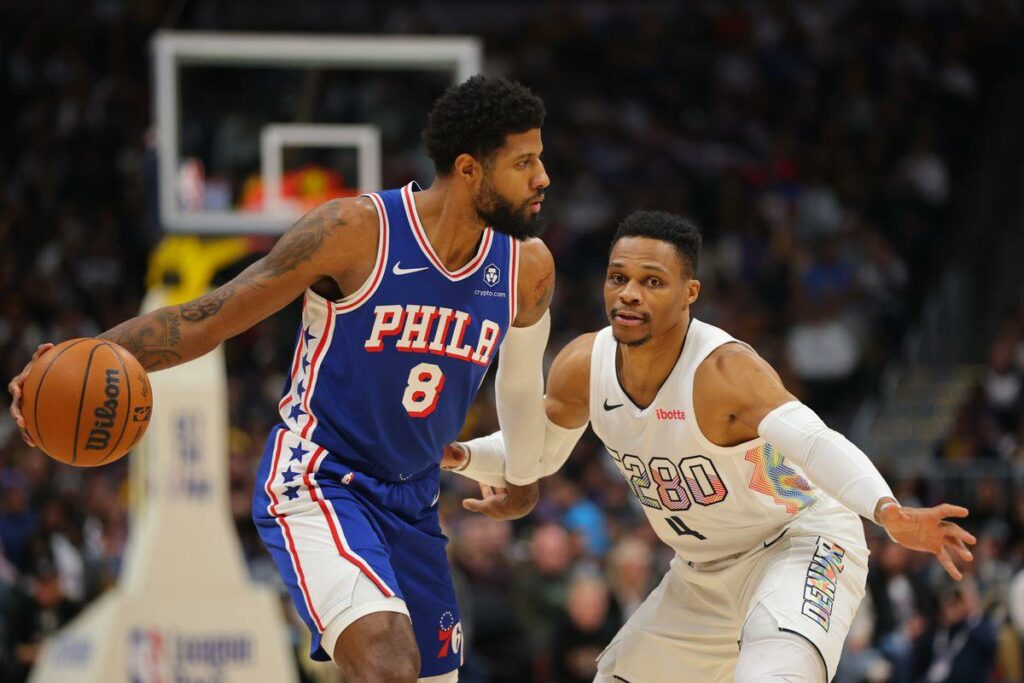 Russell Westbrook guarding Paul George