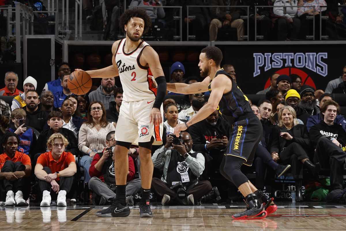 Steph Curry guarding Cade Cunningham