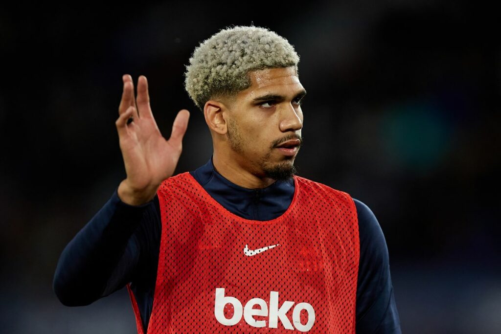 Barcelona central defender Ronald Araujo waving to fans