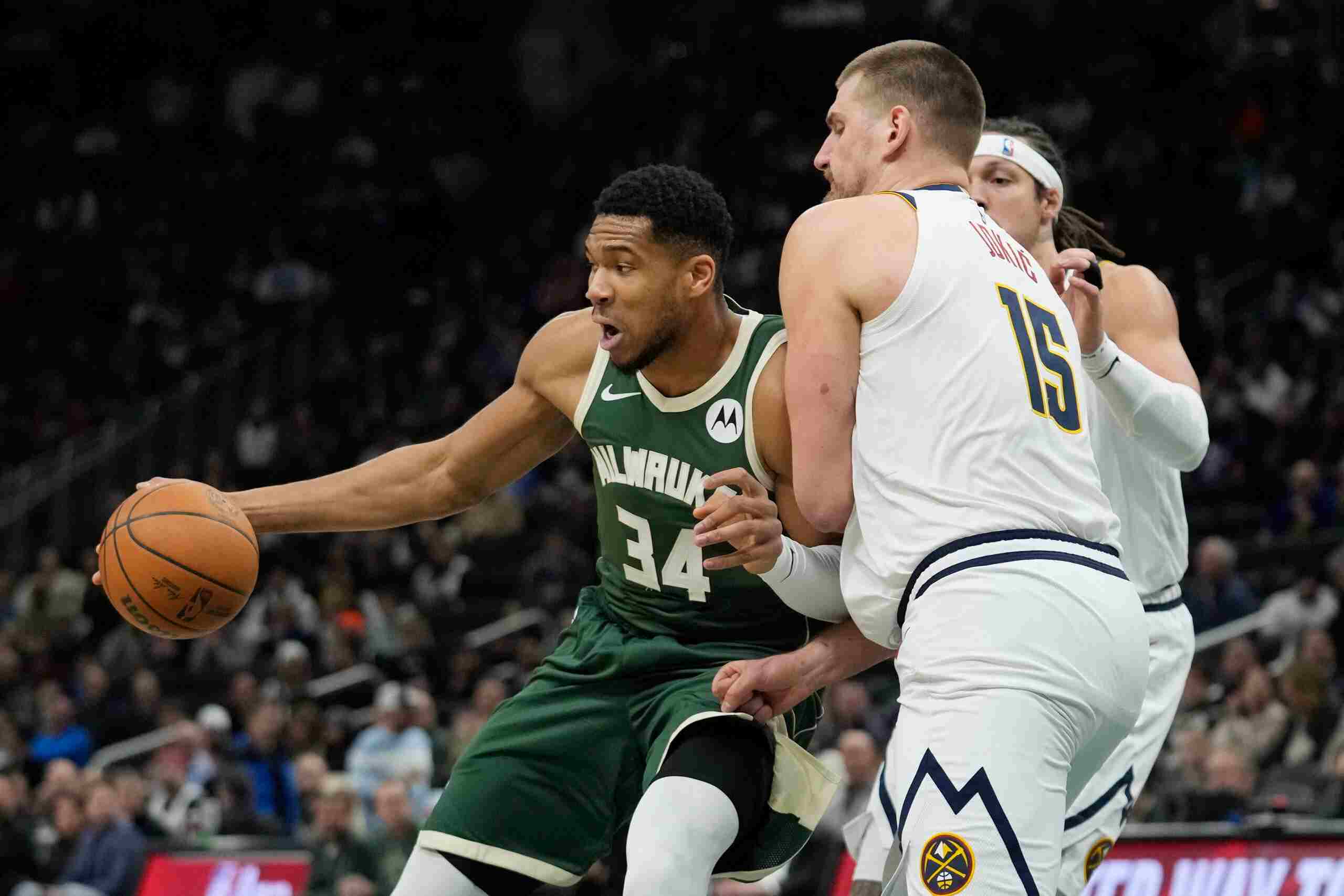 Giannis Antetokounmpo and Nikola Jokic during Bucks' win over Nuggets