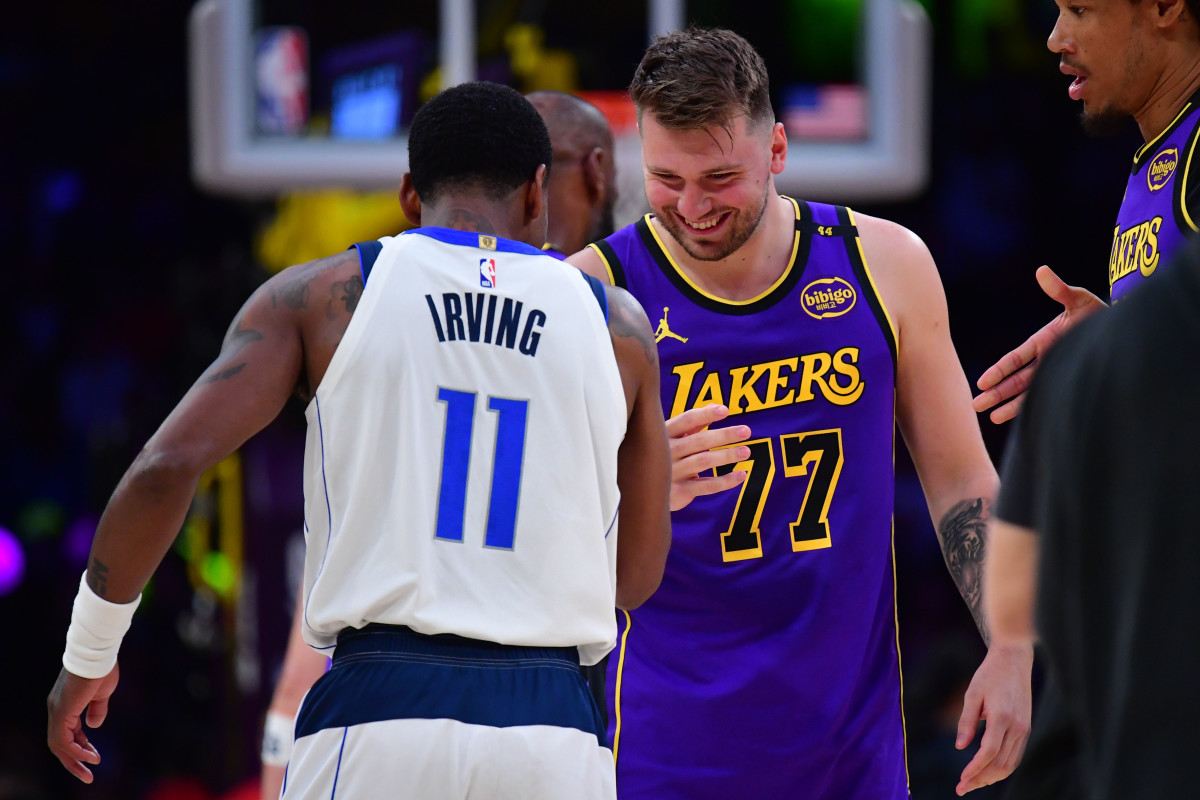 Handshake between former teammates Kyrie Irving and Luka Doncic