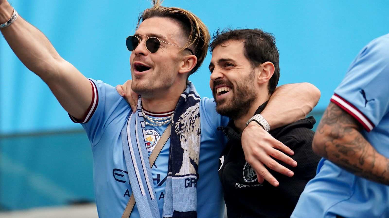 Jack Grealish and Bernardo Silva during Manchester City title celebrations