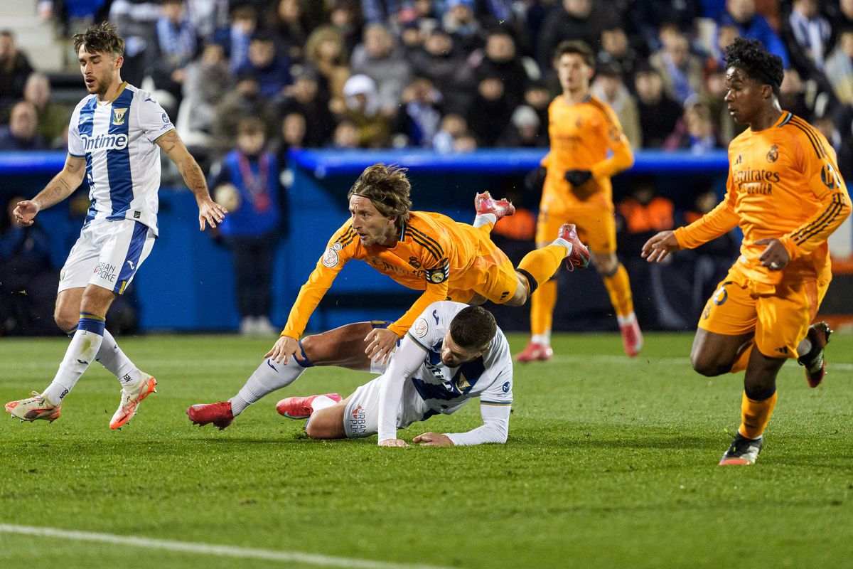 Luka Modric tackled by Leganes player