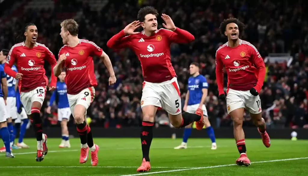 Harry Maguire celebrates after putting Manchester United 3-2 up against Ipswich