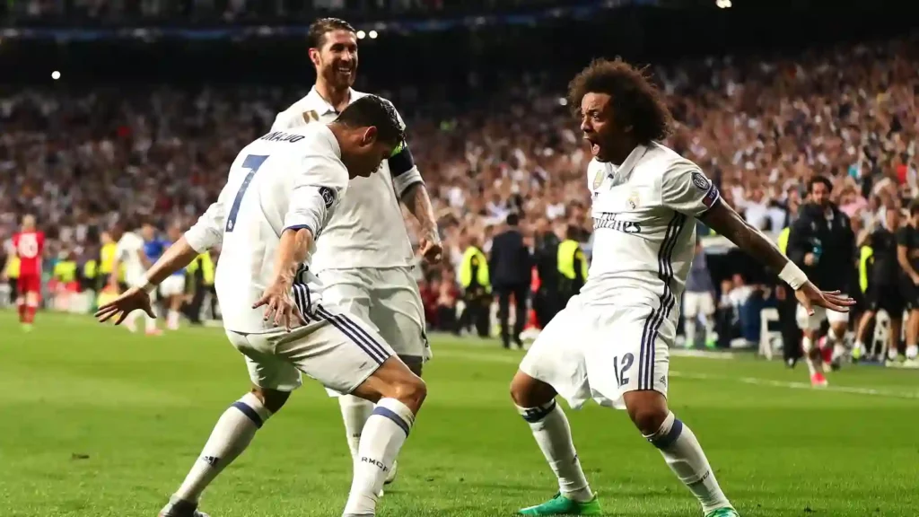 Marcelo, Cristiano Ronaldo, and Sergio Ramos celebrate Real Madrid goal