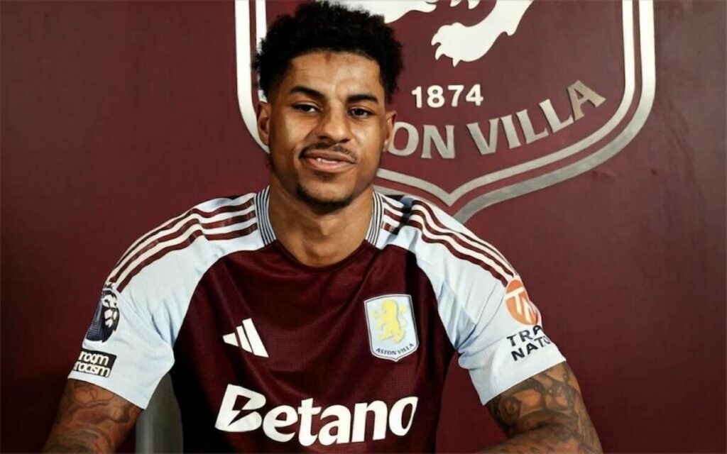 Marcus Rashford signing his Aston Villa contract