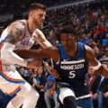 Minnesota's Anthony Edwards guarded by Oklahoma's Isaiah Hartenstein