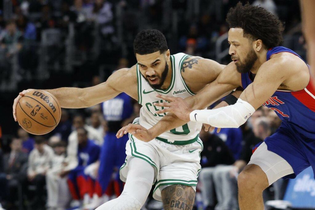 Jayson Tatum guarded by Cade Cunningham