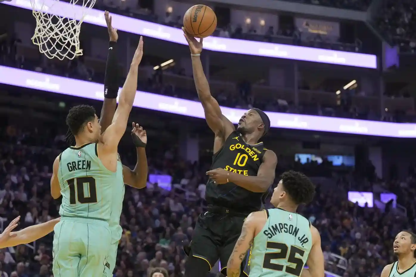 Jimmy Butler III with a lay-up against the Charlotte Hornets