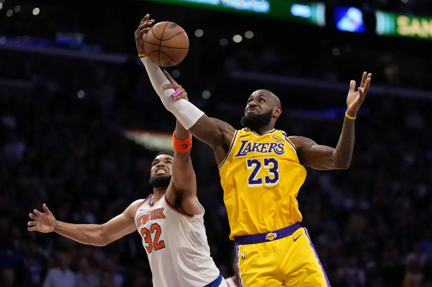 LeBron James chased by Karl-Anthony Towns