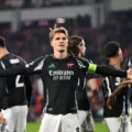 Martin Odegaard celebrates after scoring against PSV in the Champions League